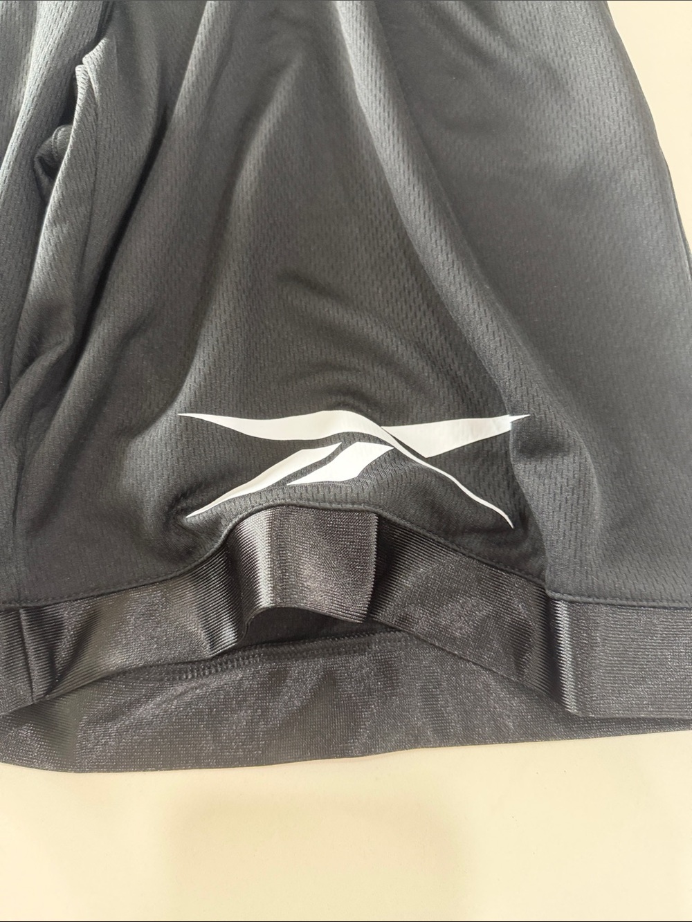 Reebok Men's Black Athletic Mesh Shorts with White Logo - Picture 2 of 4